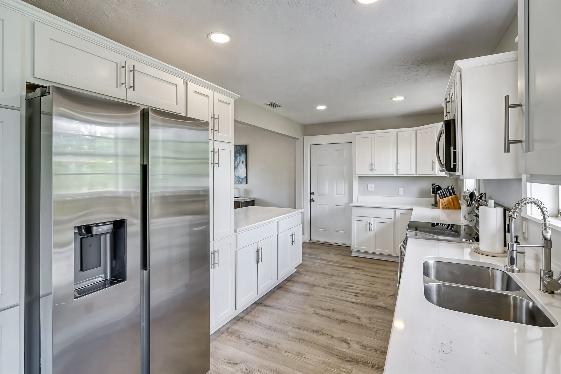 Kitchen with full-size refrigerator