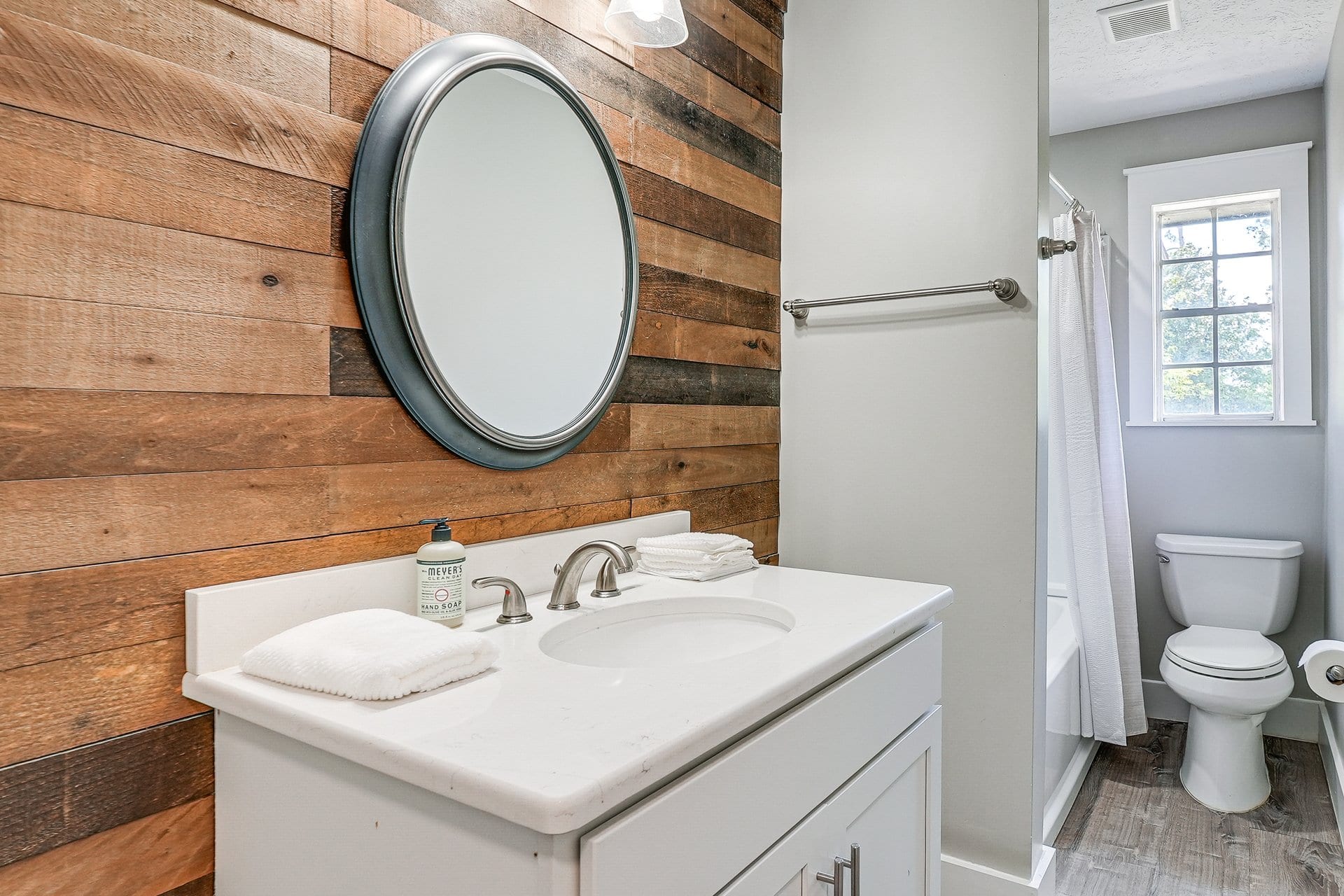 Second bathroom with reclaimed-wood accent